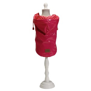 Abbigliamento per cani t.b.t. rosa con fodera a pois su manichino.