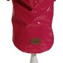 Abbigliamento per cani t.b.t. rosa con fodera a pois su manichino.
