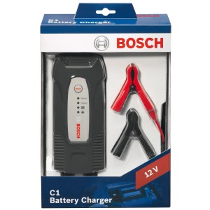 Caricabatterie Bosch C1 12V in scatola con cavo di ricarica e morsetti.