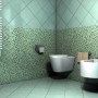 Bagno con piastrelle a mosaico verde Tasselli, WC e bidet.