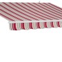 Tenda da sole t.b.t. a strisce rosso-beige per terrazzi e balconi.