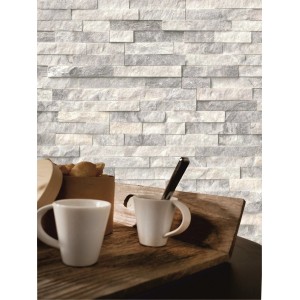 Rivestimento murale/placchette t.b.t. chiare effetto pietra come sfondo per pausa caffè.