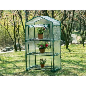 Piccola serra con tre ripiani e piante.