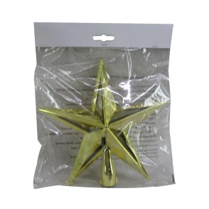 Stella dorata come puntale per decorazioni albero di Natale.