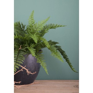 Felce artificiale in vaso, pianta finta dall'aspetto realistico per interni.