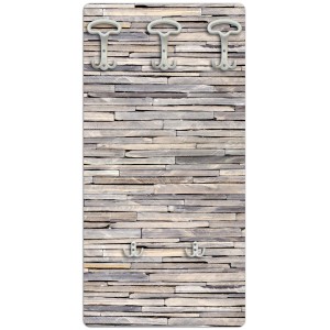 Appendiabiti t.b.t. con effetto muro in pietra e cinque ganci.