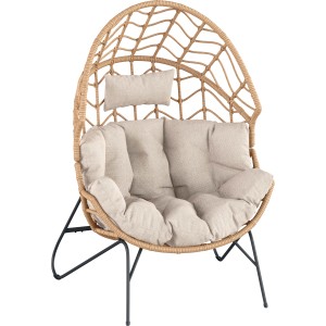 Poltrona t.b.t. intrecciata con cuscini beige e struttura nera per esterni.