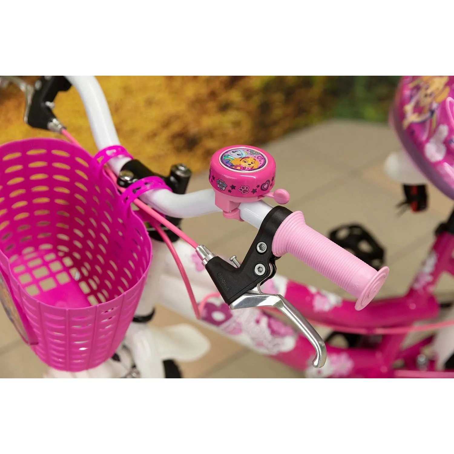 Manubrio bici con manopole rosa, campanello e cestino. Accessori per la manutenzione bici.