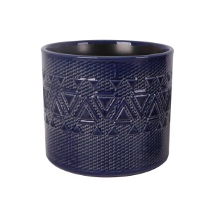 Vaso decorativo blu con motivo geometrico per piante da interno.