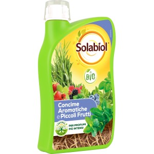 Flacone verde di Solabiol Concime per piante aromatiche e piccoli frutti.