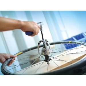 Estrattore a 3 bracci LUX Comfort 90 mm in uso su una bicicletta.
