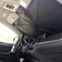 t.b.t. Parasole per auto a forma di ombrello, montato sul parabrezza.