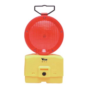 Luce di segnalazione rossa con base gialla e maniglia per cantieri e sicurezza stradale.