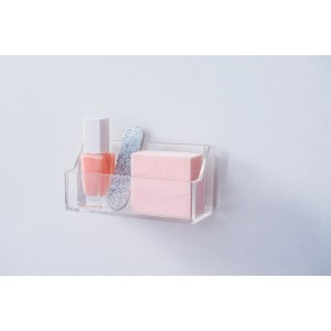 Porta accessori bagno trasparente con smalto, lima e spugna. Accessorio per mobili da bagno.