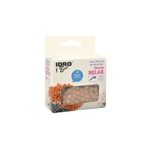 t.b.t. Accessorio doccia: scatola con sfere minerali grigie, arancioni e bianche.