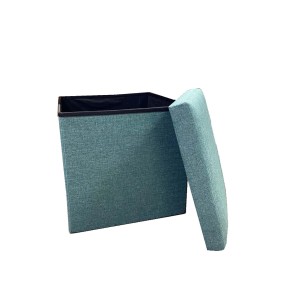 Pouf turchese aperto con coperchio rimosso.