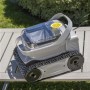 Robot per piscina t.b.t. grigio con cingoli e contenitore trasparente.