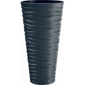 Colonna portapiante t.b.t. grigio scuro con superficie ondulata.