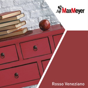 MaxMeyer t.b.t. Smalti colorati: Dettaglio di un elemento a cassetti rosso con libri e sfera decorativa.
