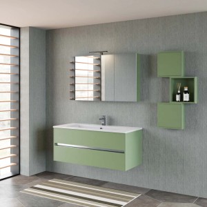 Moderno set di mobili da bagno verde con lavabo, specchiera e mensole per un design elegante del bagno.