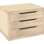 Cassettiera t.b.t. con tre cassetti in legno chiaro e superficie beige.