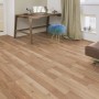 Pavimento in laminato Comfort Quercia Royal Elm 7 mm installato in soggiorno con mobili.