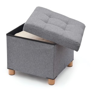 Sgabello/poggiapiedi t.b.t. grigio con contenitore e coperchio rimovibile.