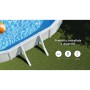 Piscina ovale Gre Bora Bora fuori terra con pareti in acciaio bianche e supporti in giardino, acqua blu.