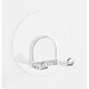 Gancio da parete doppio Wenko Static-Loc trasparente in plastica per asciugamani, montato su una parete bianca.