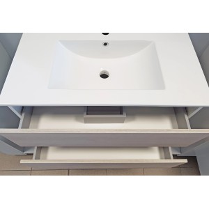 t.b.t. Mobile bagno con cassetti e lavabo bianco.