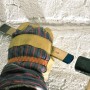 Scalpello per scanalature LUX Comfort in uso per scalpellare una scanalatura in un muro.