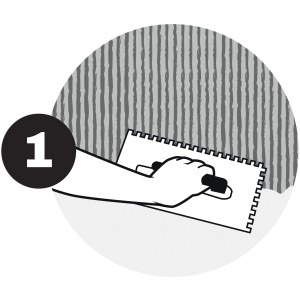 Applicazione di malta adesiva con spatola dentata per rivestimenti Elabrick.