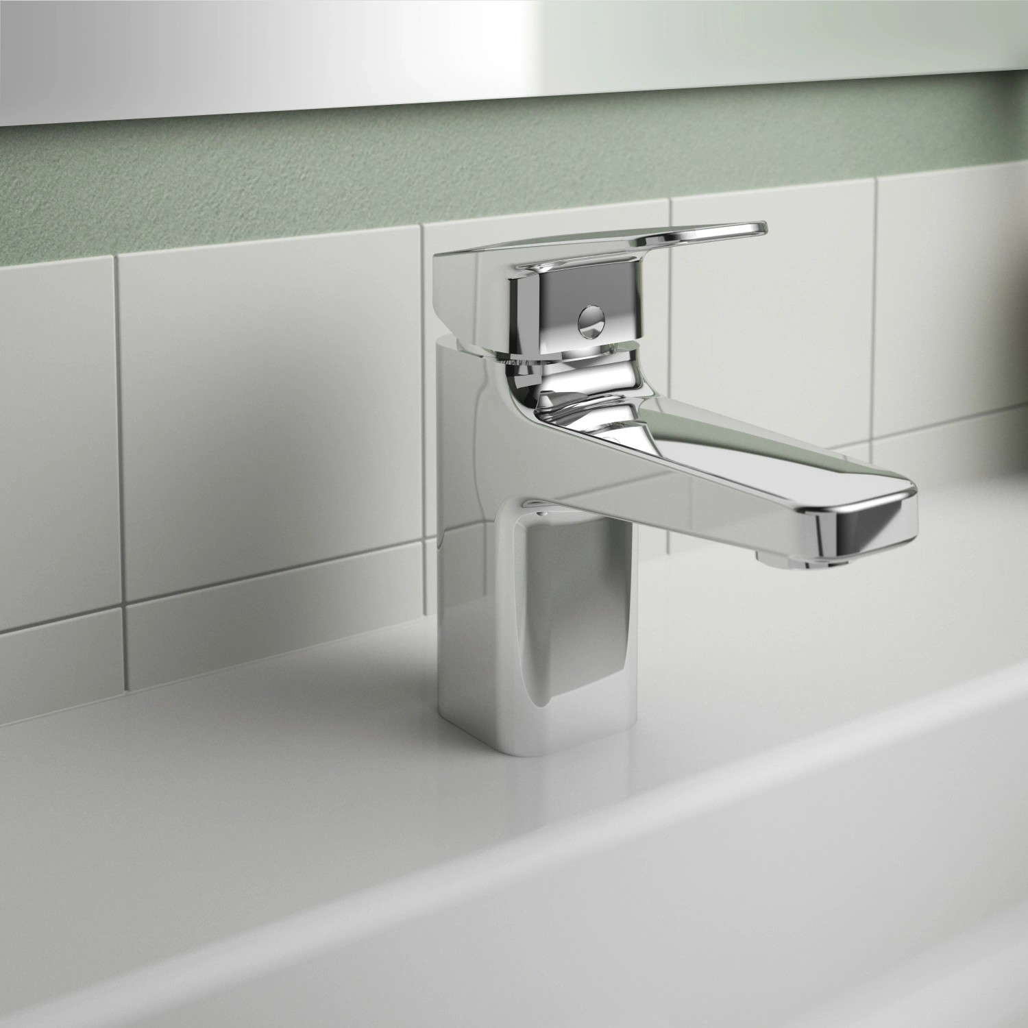 Miscelatore lavabo Ideal Standard Ceraplan cromato H75 su lavabo bianco.
