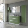 Moderno set di mobili da bagno verde con mobile lavabo, specchio, pensile e mensole.