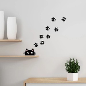 Set di adesivi murali: gatto nero con impronte di zampe come decorazione murale.
