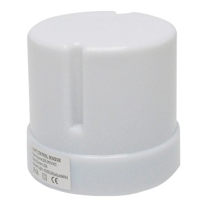 Primo piano di un sensore t.b.t. bianco per il controllo della luce.