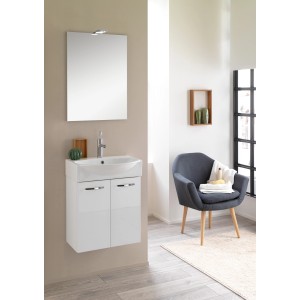 Mobile bagno bianco con specchio e mobiletto.