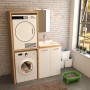 Lavatrice e asciugatrice in set di mobili da bagno. Soluzione compatta per bagni piccoli.