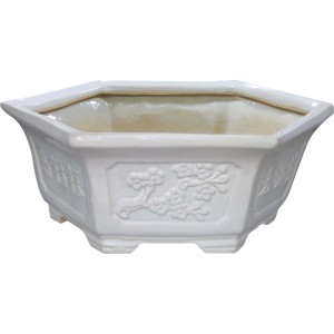 Portavasi t.b.t. esagonale bianco con rilievo floreale.