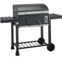 Barbecue a carbone Jamestown Jaxon XL con griglia modulare e tavoli laterali.