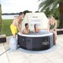 Bestway LAY-Z-SPA con parasole. Idromassaggio con persone in giardino.