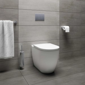 WC moderno sospeso (t.b.t.) bianco su parete grigia. WC Filo Muro.