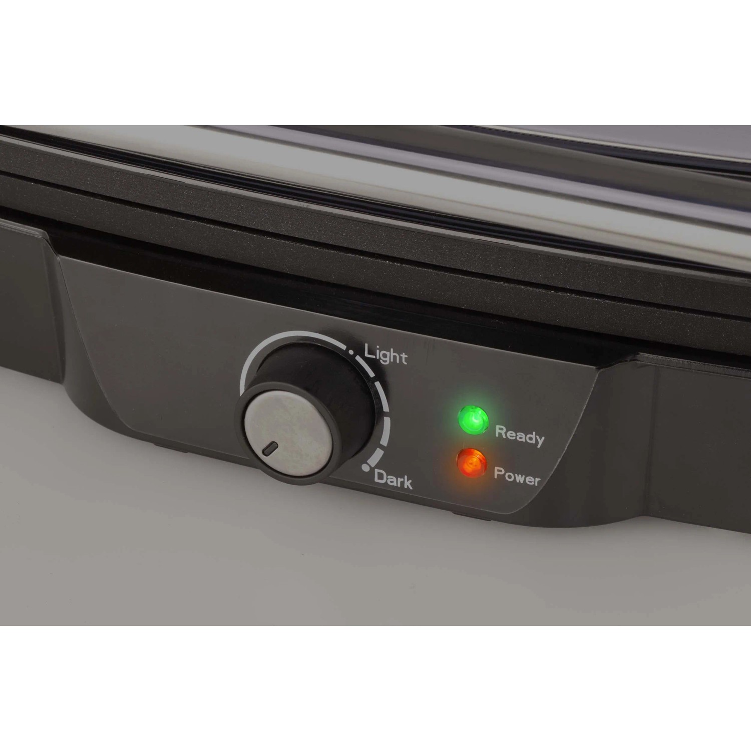 Dettaglio di una piastra di cottura t.b.t. con controllo della temperatura e spie.