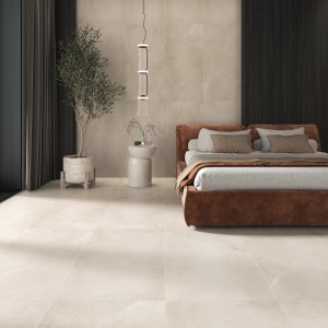 Piastrella per pavimento in gres porcellanato Urban opaca chiara (119,8x119,8 cm) in una camera da letto moderna.