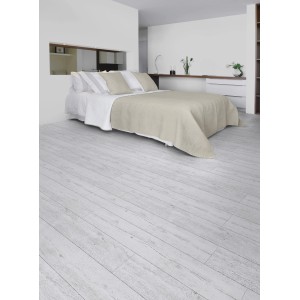 Camera da letto con pavimento vinilico autoadesivo Gerflor Senso Rustic White Pecan effetto legno.