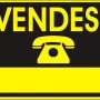 Cartello giallo "Vendesi" con simbolo del telefono per esterni.