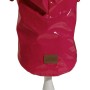 Abbigliamento per cani t.b.t. rosa con fodera a pois su manichino.