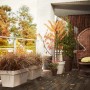 Vaso alto bianco Elho Loft Urban (Ø 42 cm) su una terrazza con piante.