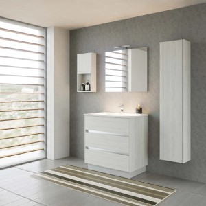 Set bagno moderno con lavabo, specchiera e mobile alto in legno chiaro.