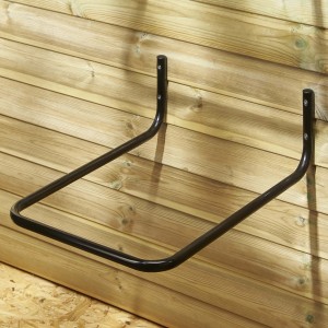 Supporto a parete nero t.b.t. per pannelli forati su parete in legno.